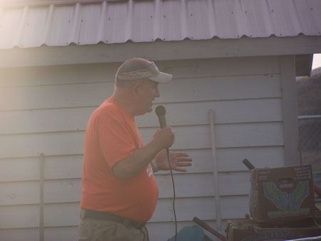Workshop Presenter Speaking into a Microphone