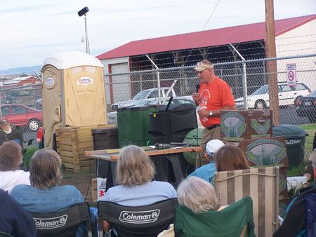 Workshop Presenter Beside a Table